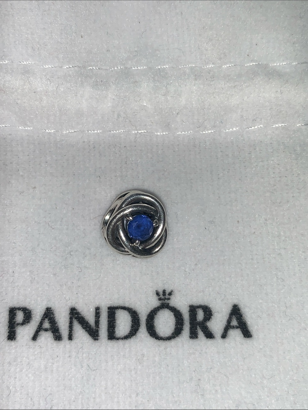 Pandora Sterling Silver Knot charm Sept sapphire Blue Stone